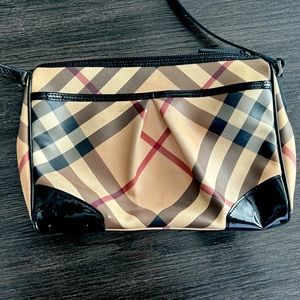 Burberry purse. Long strap, can wear crossbody.